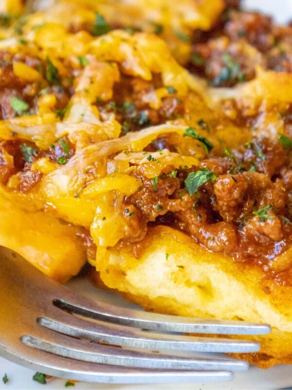 a slice of bbq beef casserole on a white plate