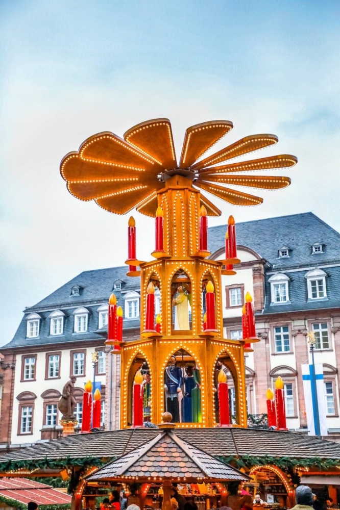 A festive Christmas market in the heart of a European city.