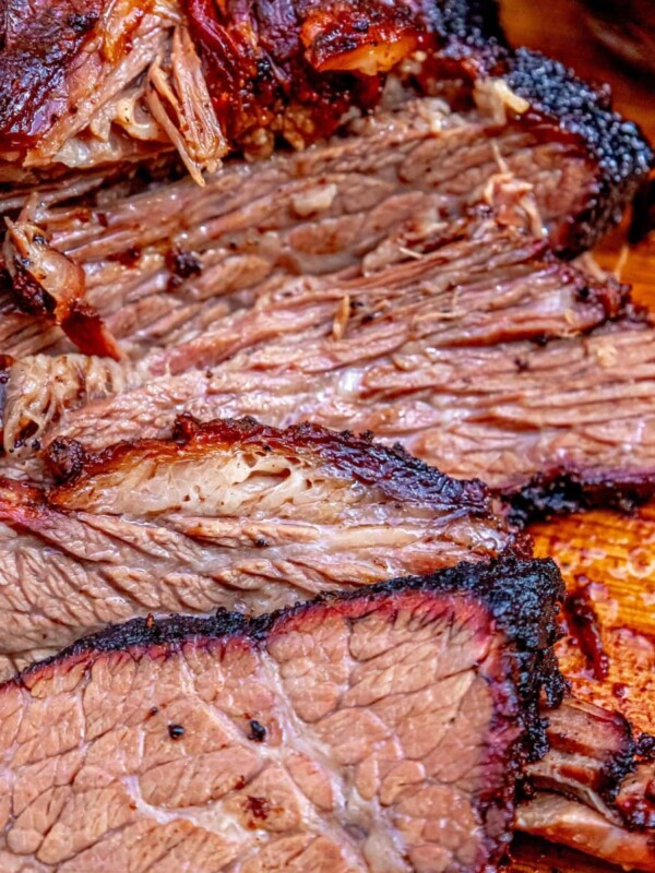 picture of smoked brisket on a wooden cutting board