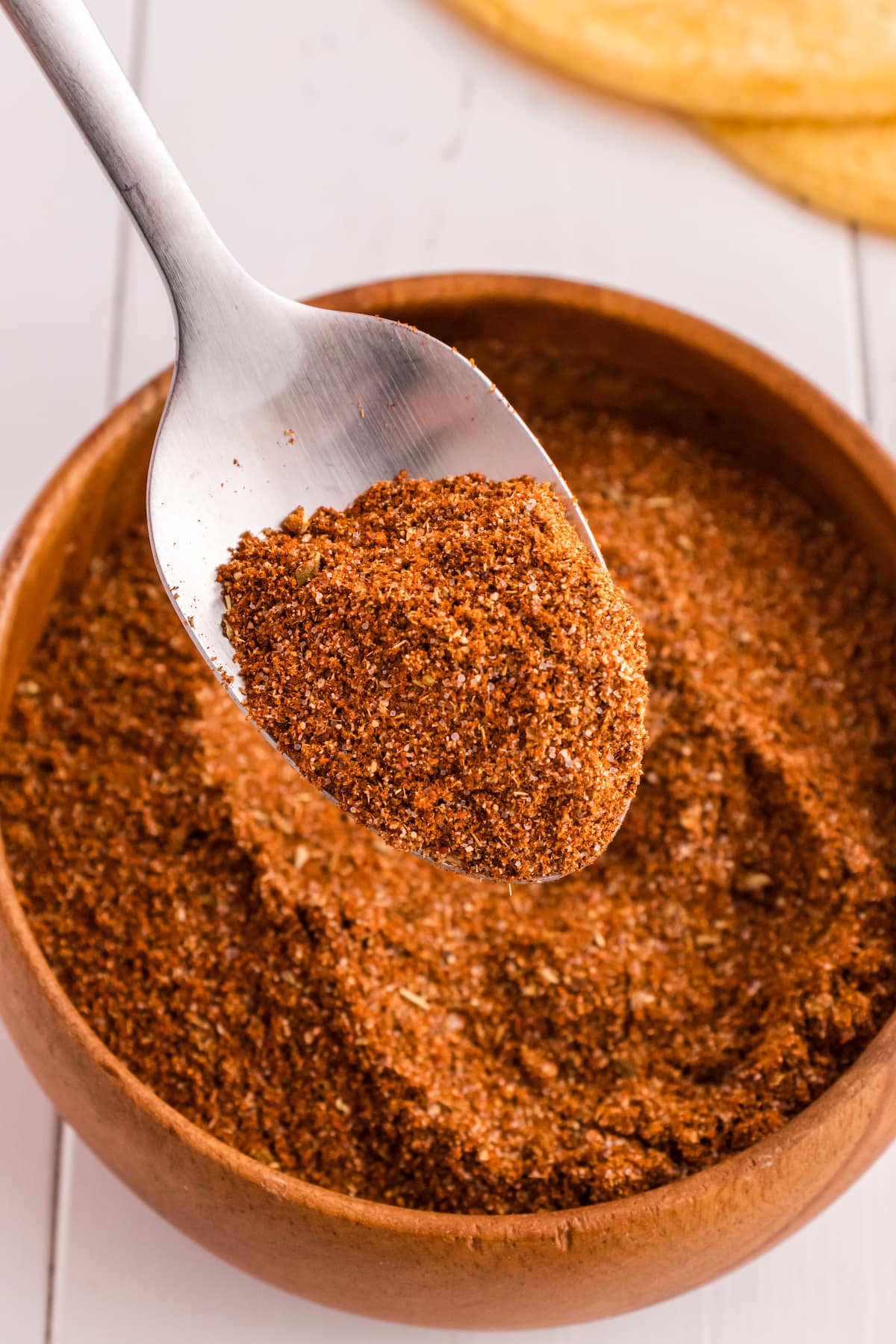 taco seasoning in a bowl on a spoon
